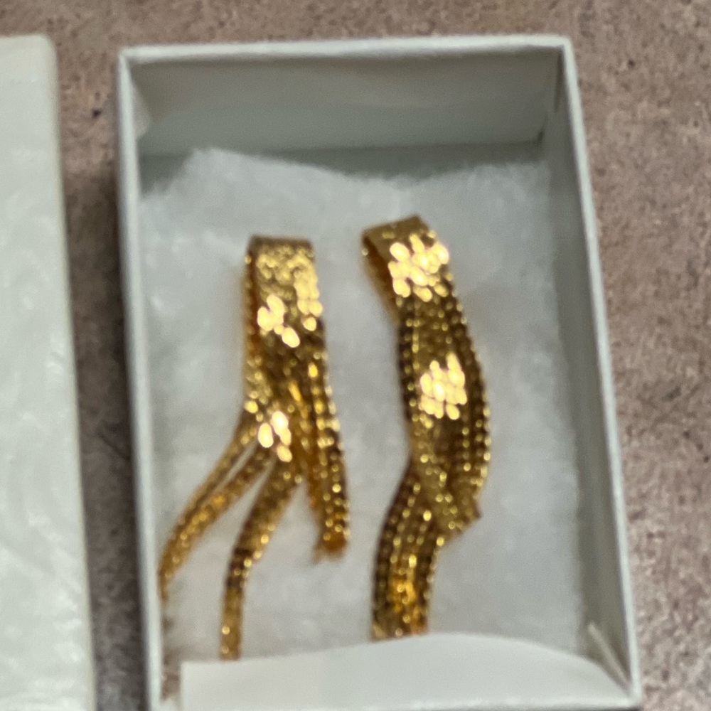 2” long herringbone pierced post gold earrings.